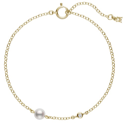 Mikimoto 18k yellow gold Station bracelet with a pearl and a diamond, 5mm/A+ akoya pearl and a round diamond weighing 0.02 carat weight, 7/6.25
