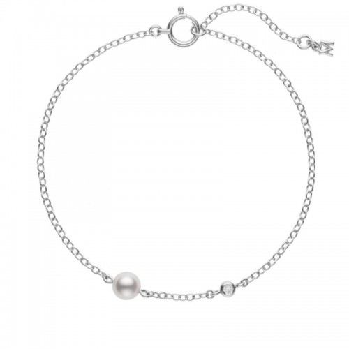 Mikimoto 18k white gold rhodium plated Station bracelet with a pearl and a diamond, 5mm/A+ akoya pearl and a round diamond weighing 0.02 carat weight, 7