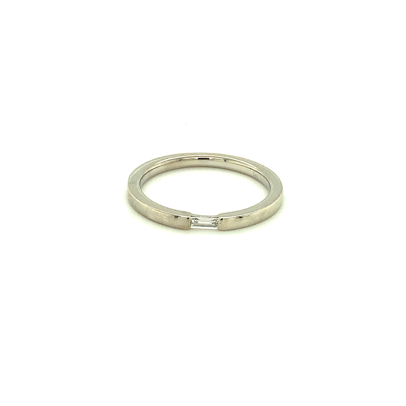 Lisa Nik 18k white gold rhodium plated Sparkle stackable band with a baguette diamond weighing 0.08 carat weight