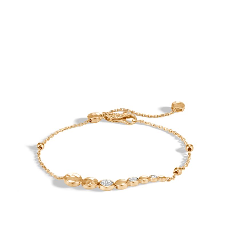 John Hardy 18k yellow gold Dot hammered pull through bracelet with diamonds, 37.5mm station with diamonds weighing 0.07 carat total weight, 1.2mm bracelet with lobster clasp