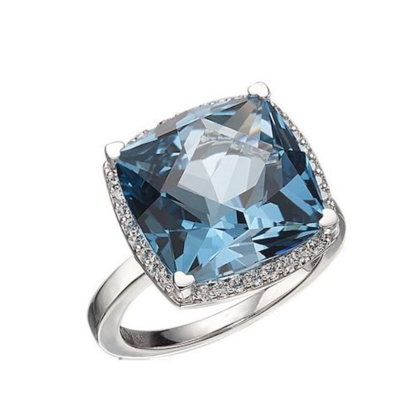 Lisa Nik 18k white gold rhodium plated Rocks 13mm cushion shape blue topaz ring with diamond halo weighing 0.26 carat total weight