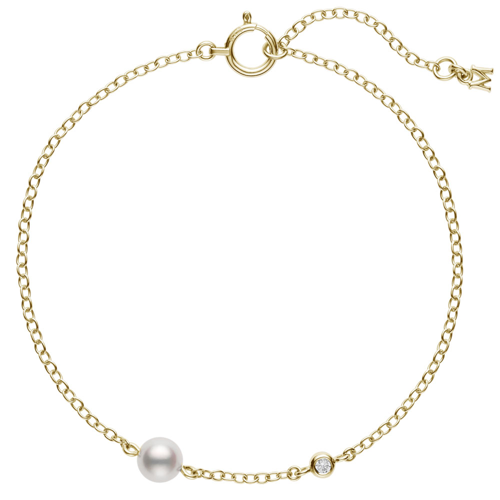 Mikimoto 18k yellow gold Station bracelet with a pearl and a diamond, 5mm/A+ akoya pearl and a round diamond weighing 0.02 carat weight, 7"/6.25"