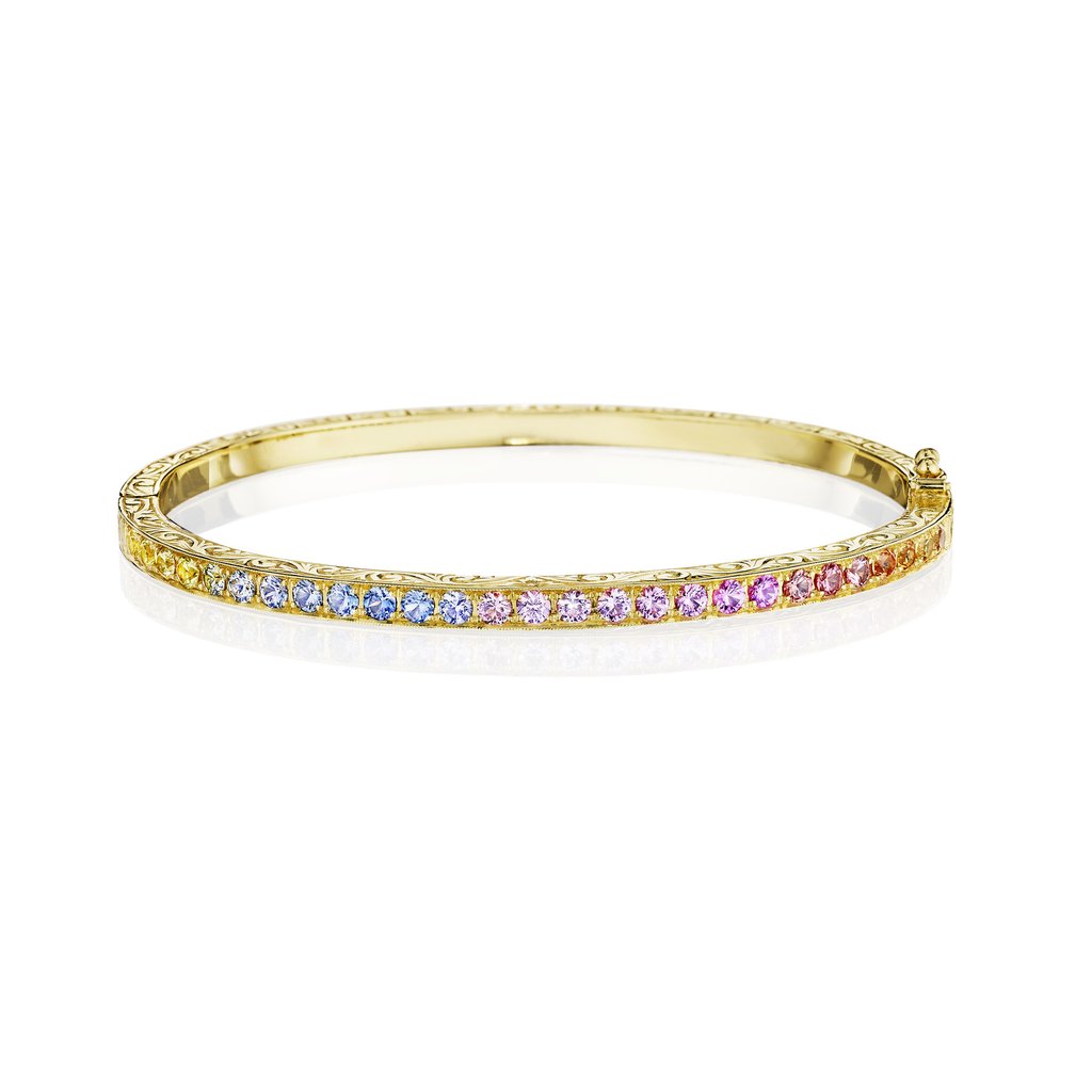 Penny Preville 18k yellow gold thin pave hinged bangle bracelet with rainbow sapphires weighing 1.75 carat total weight