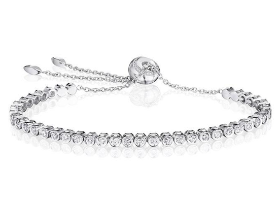 Penny Preville 18k white gold rhodium plated bezel set flexible bracelet with diamonds weighing 1.15 carat total weight, 7"