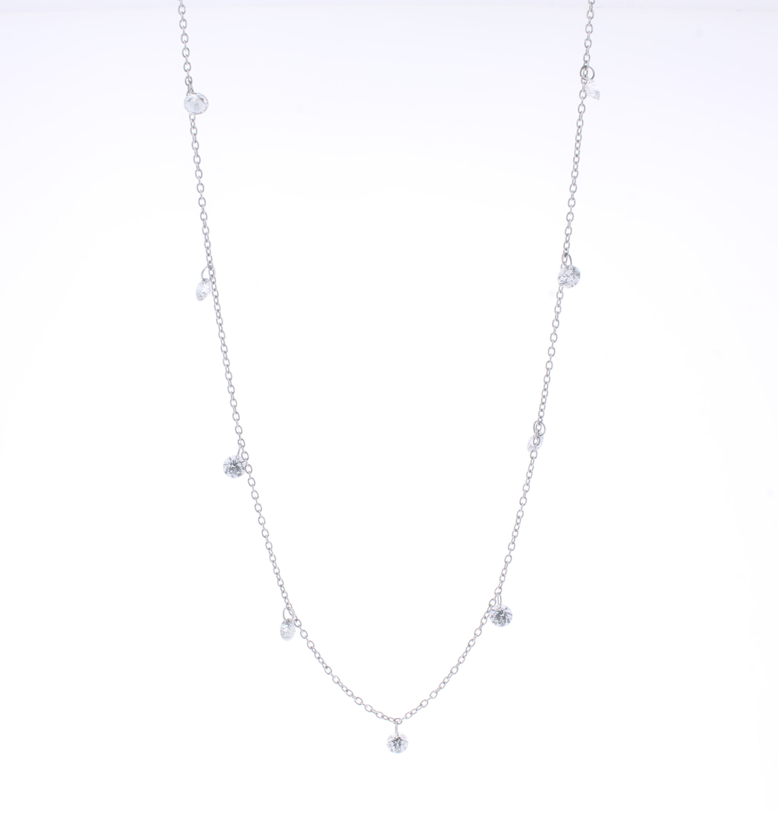 Penny Preville 18k white gold rhodium plated 9 station dangle drilled diamond necklace weighing 1.80 carat total weight