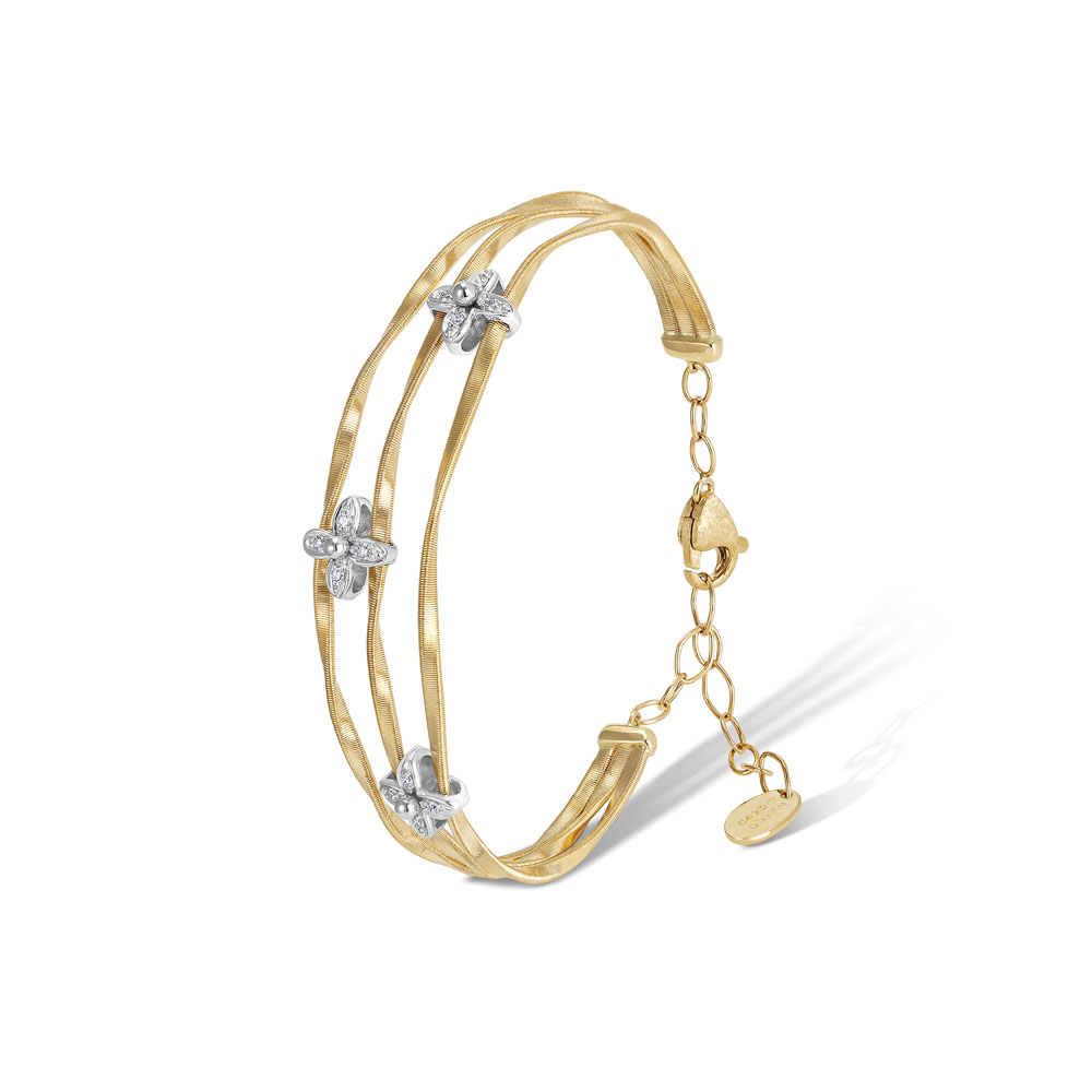 Marco Bicego 18k yellow gold and 18k white gold rhodium plated Marrakech Onde 3 row bangle bracelet with 3 diamond flower stations weighing 0.09 carat total weight, 2.4"