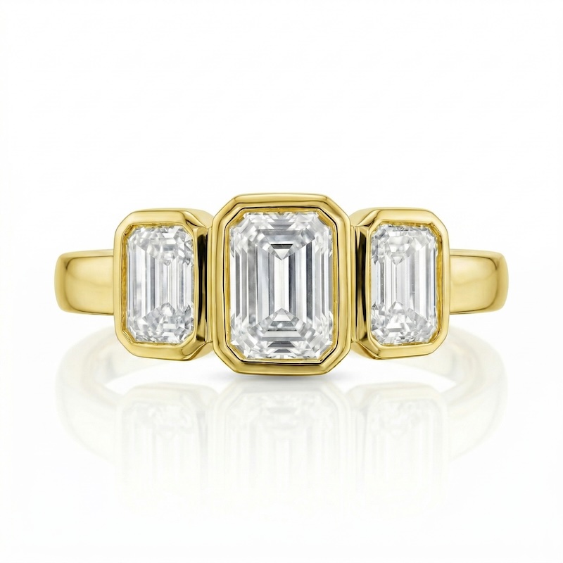 Bachendorf's 18K Yellow Gold Bezel Set Three Stone Ring
